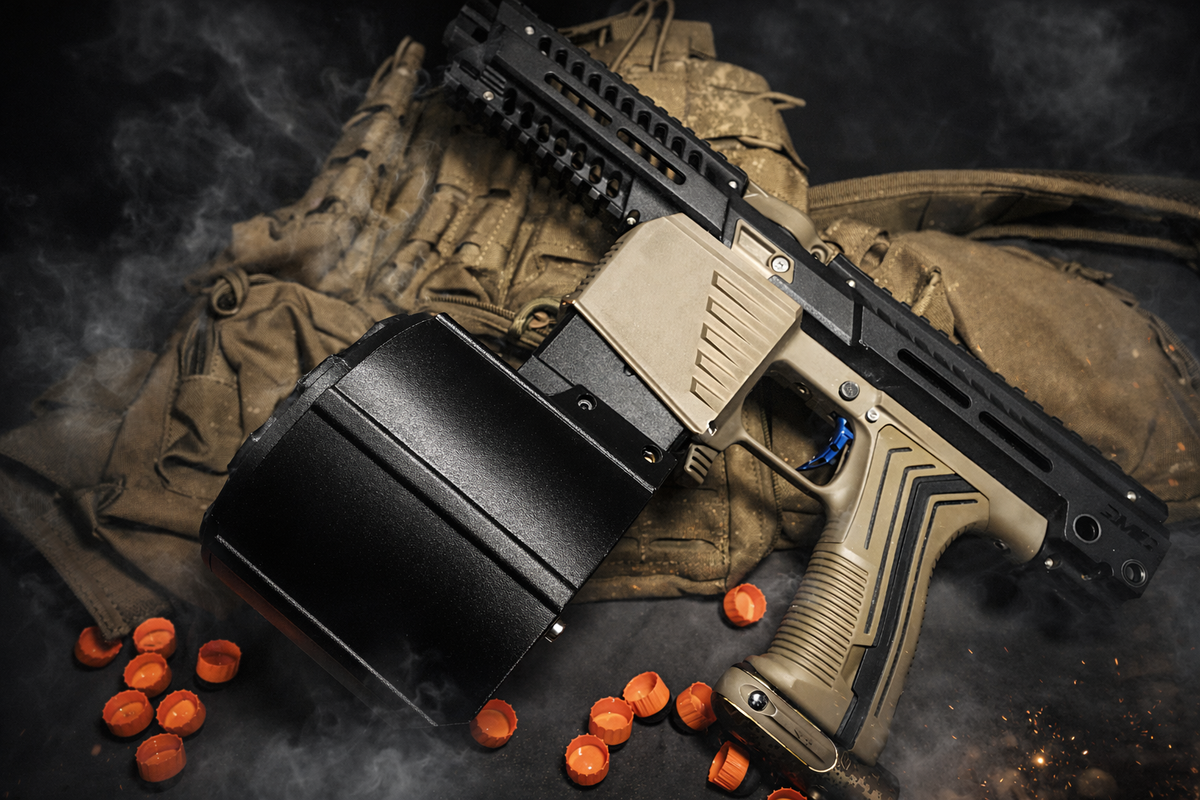 VENOM MK-1 40-round paintball drum mag installed on a magfed paintball marker with First Strike Rounds